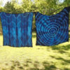 Photo of two fabrics dyed in shibori indigo style