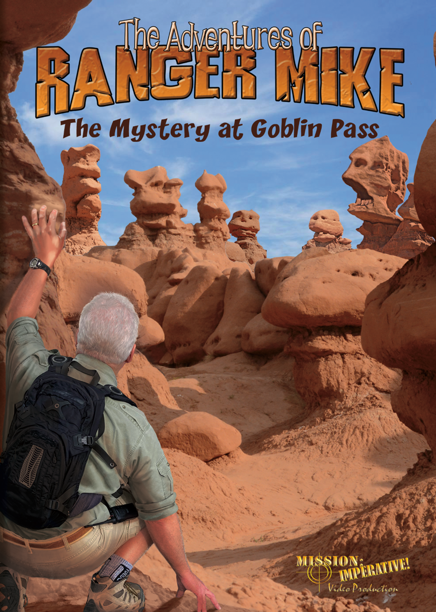 Ranger Mike The Mystery at Goblin Pass The Ranger Mike DVD The Mystery at Goblin Pass front cover with Ranger Mike from the back looking at unusual red rock formations.